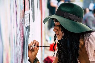 A woman painting.